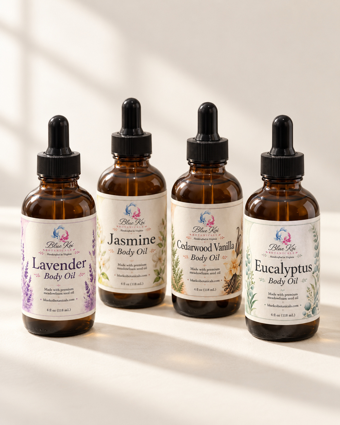 Blue Koi body oils in Jasmine, Eucalyptus, Cedarwood Vanilla, and Lavender