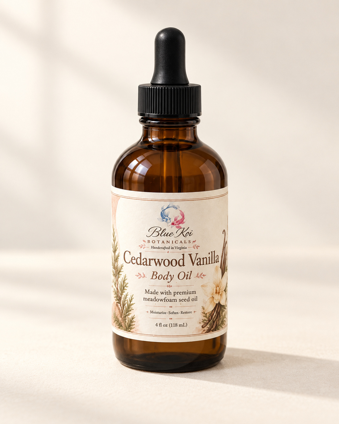 Blue Koi Cedarwood Vanilla Body Oil in an amber glass bottle